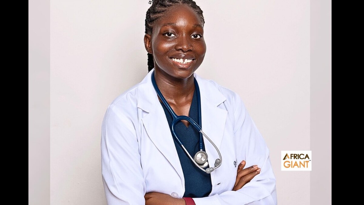 Dr. Chioma Obunadike, one of the world's youngest doctors featured on Africa Giant, smiling in her white coat.